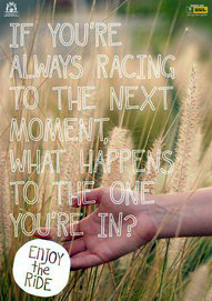 Image of a hand and the words If you're always racing too the next moment.  What happens to the one you are in?