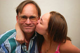 Daughter kissing step-dads cheek
