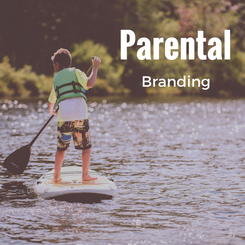 Boy on paddle board Says Parental Branding