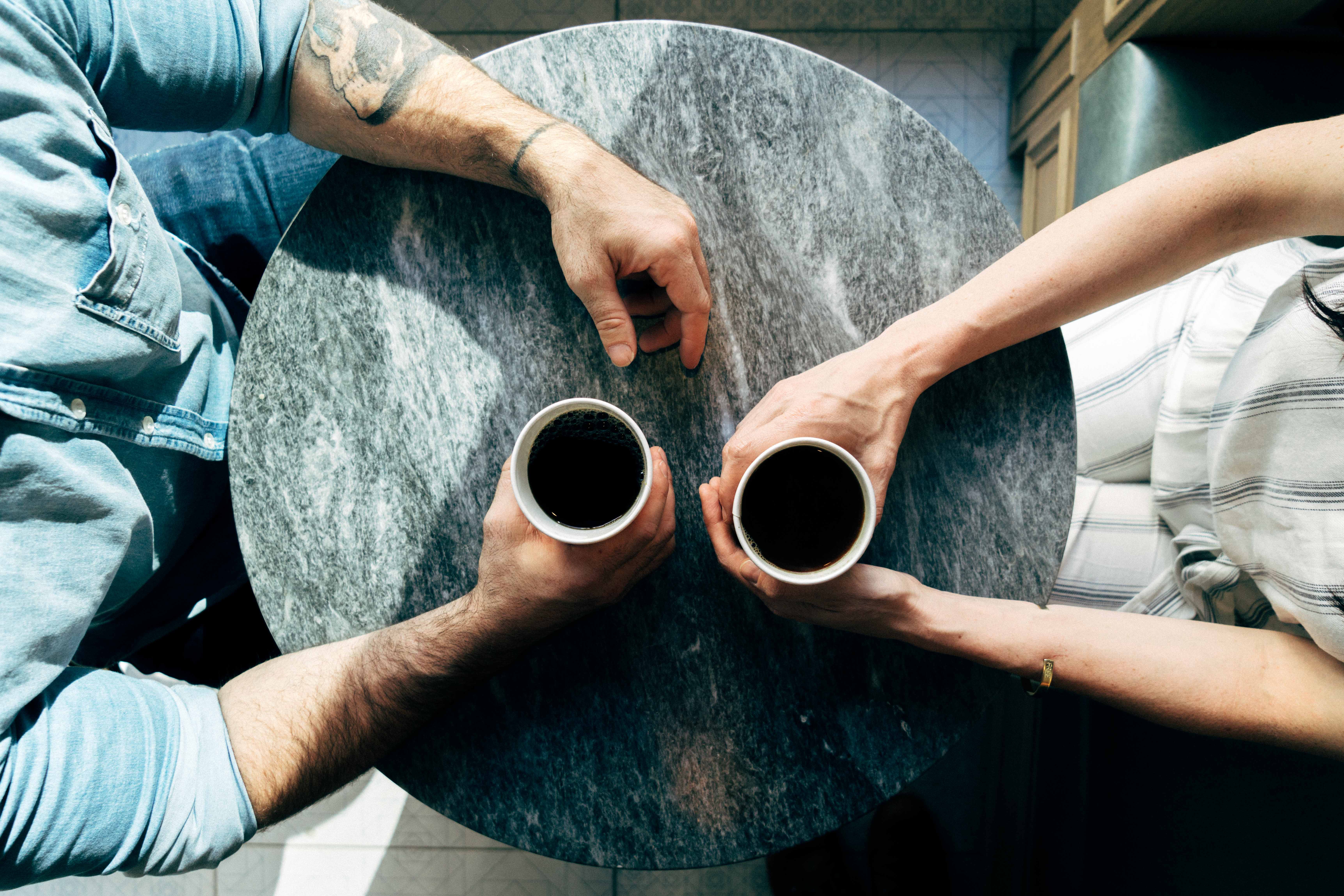 overview of two people having coffee